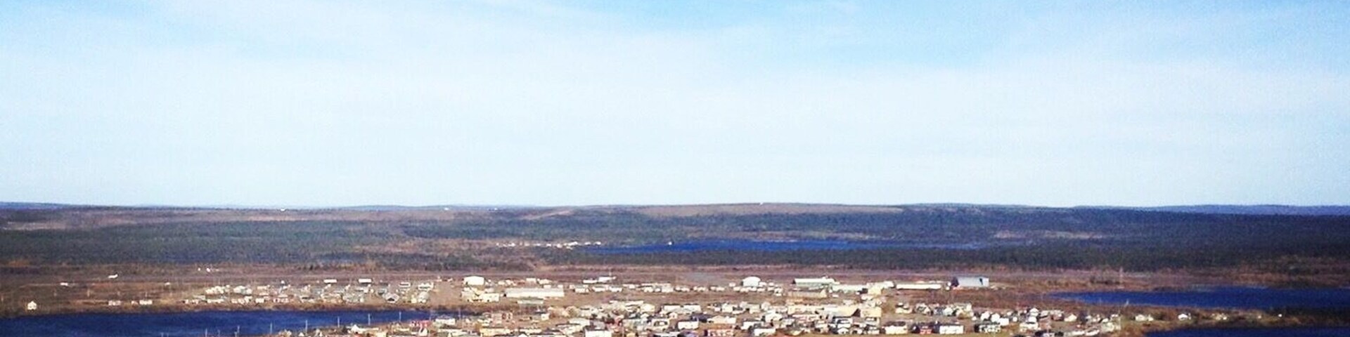 The view from the cross if you hike or take a four wheeler to the top. Best spot to view the whole town and also an interesting landscape itself with green lichen, red earth and many kinds of rocks.
#canadasnorth #subarctic