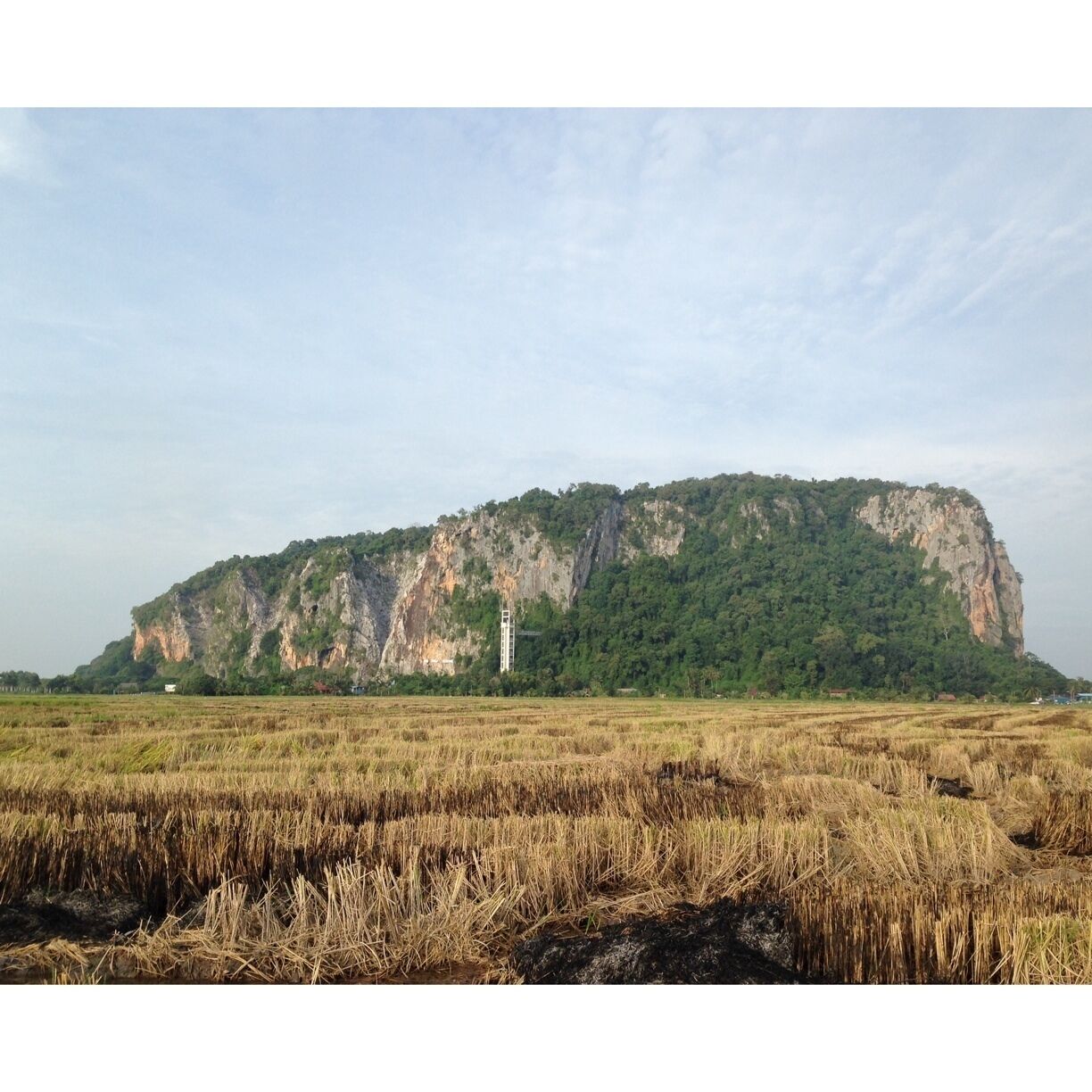 Take time to visit this massive hill and it's many caves. For a small fee get a local to guide and show you the trail and caves. Surprises awaits you in the cave :)