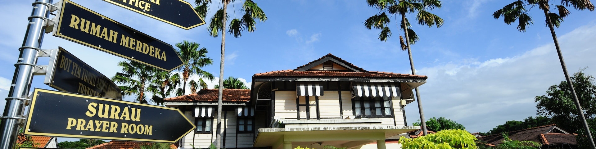 Alor Setar which includes a garden, a small town or village and signage