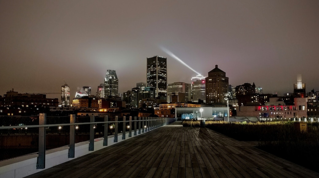 Looking back into the city of Montreal from the docks at Grand Quai.