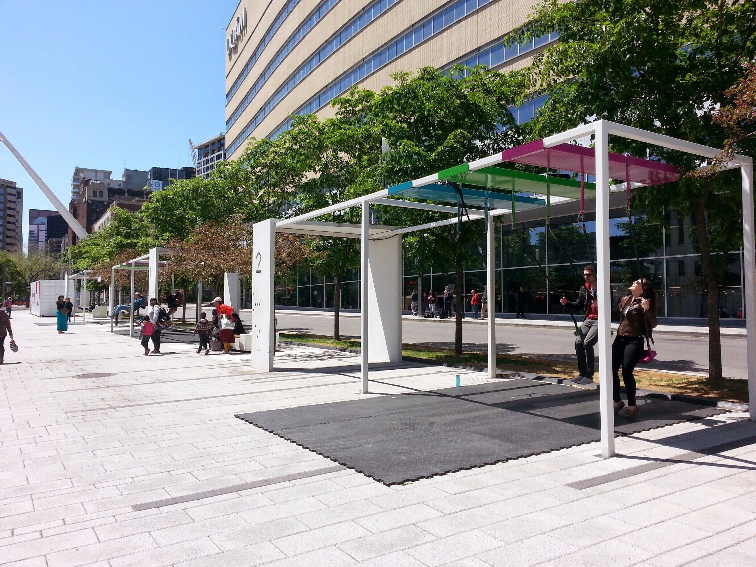 Outside the Metro station, sets of musical swings that you can "play" together