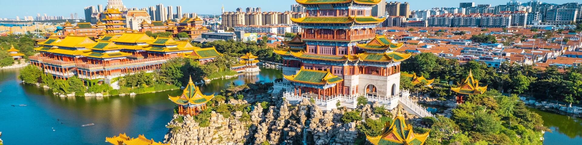 Aerial photography of the scenery of the three immortal mountains by the sea in Penglai, Shandong Province