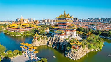 Aerial photography of the scenery of the three immortal mountains by the sea in Penglai, Shandong Province