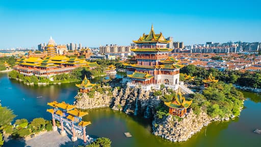 Aerial photography of the scenery of the three immortal mountains by the sea in Penglai, Shandong Province