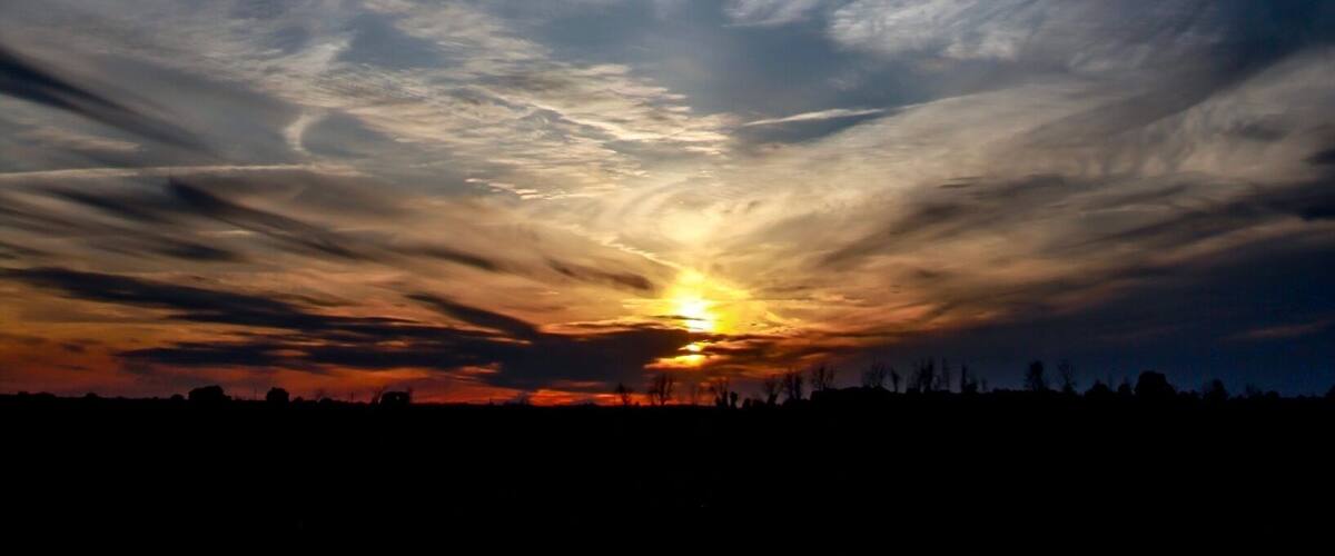 Sunset over a cornfield near Richmond Ontario Canada in later June. Canon. 5D Mark2 Tokina SDii 28-70mm