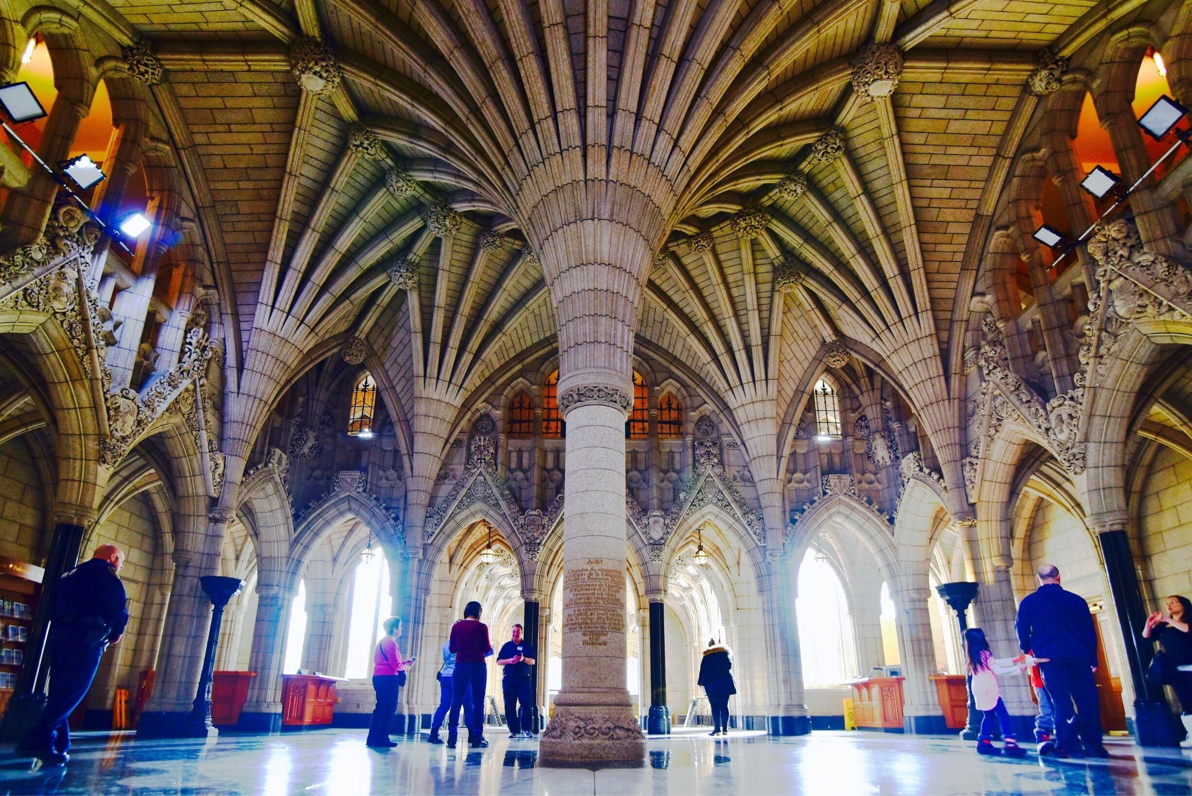 A cathedral interior with Gothic architecture, including pointed arches and ribbed vaults.