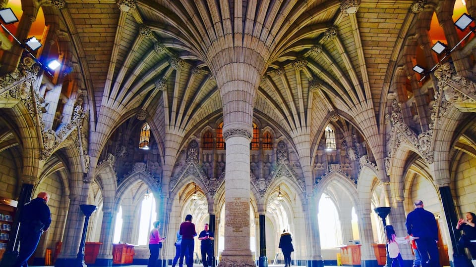 A cathedral interior with Gothic architecture, including pointed arches and ribbed vaults.