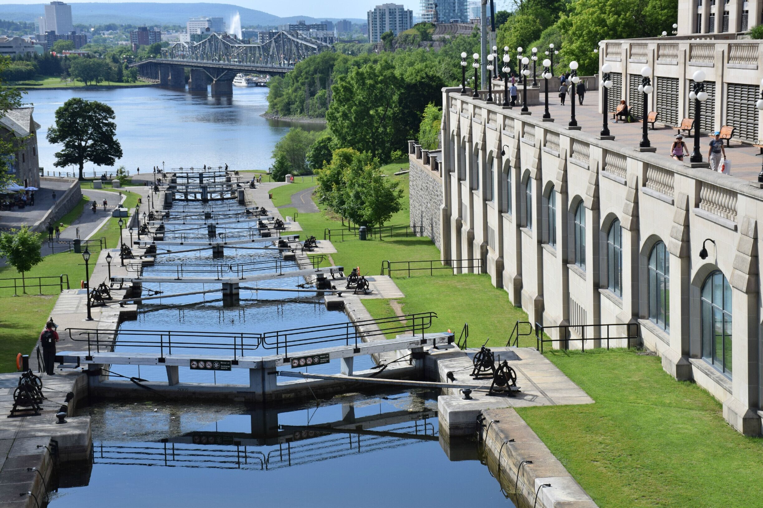 The locks beside the Chateau Laurier (on the right) allow boats to get from the Rideau Canal to the Ottawa River.  The locks work the same way they did when the Canal was built in 1832, by 'flushing' the boats down to the river.  The Canal was recently named a UNESCO World Heritage Site.