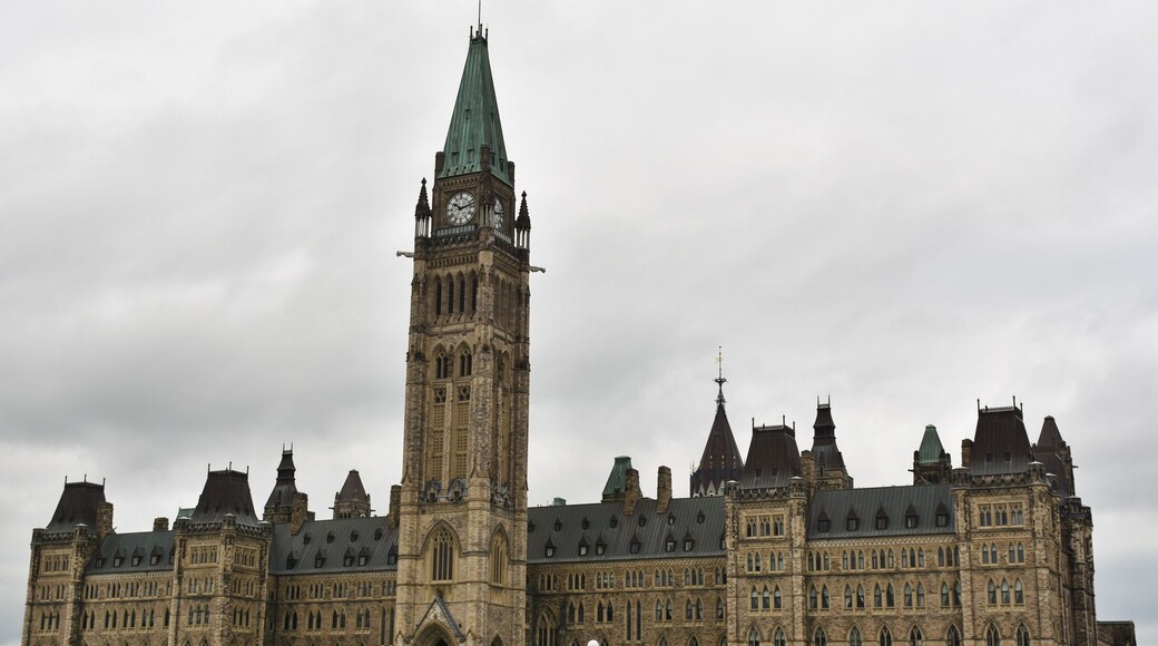 #LKsAwayDays Ottawa, colloquially known as The Hill, is an area of Crown land on the southern banks of the Ottawa River in downtown Ottawa, Ontario, Canada. Its Gothic revival suite of buildings is the home of the Parliament of Canada and has architectural elements of national symbolic importance. Parliament Hill attracts approximately 3 million visitors each year.
Originally the site of a military base in the 18th and early 19th centuries, development of the area into a governmental precinct began in 1859, after Queen Victoria chose Ottawa as the capital of the Province of Canada. Following a number of extensions to the parliament and departmental buildings and a fire in 1916 that destroyed the Centre Block, Parliament Hill took on its present form with the completion of the Peace Tower in 1927