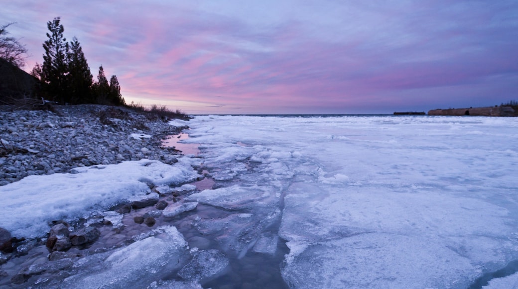Alpena showing snow, a lake or waterhole and a sunset