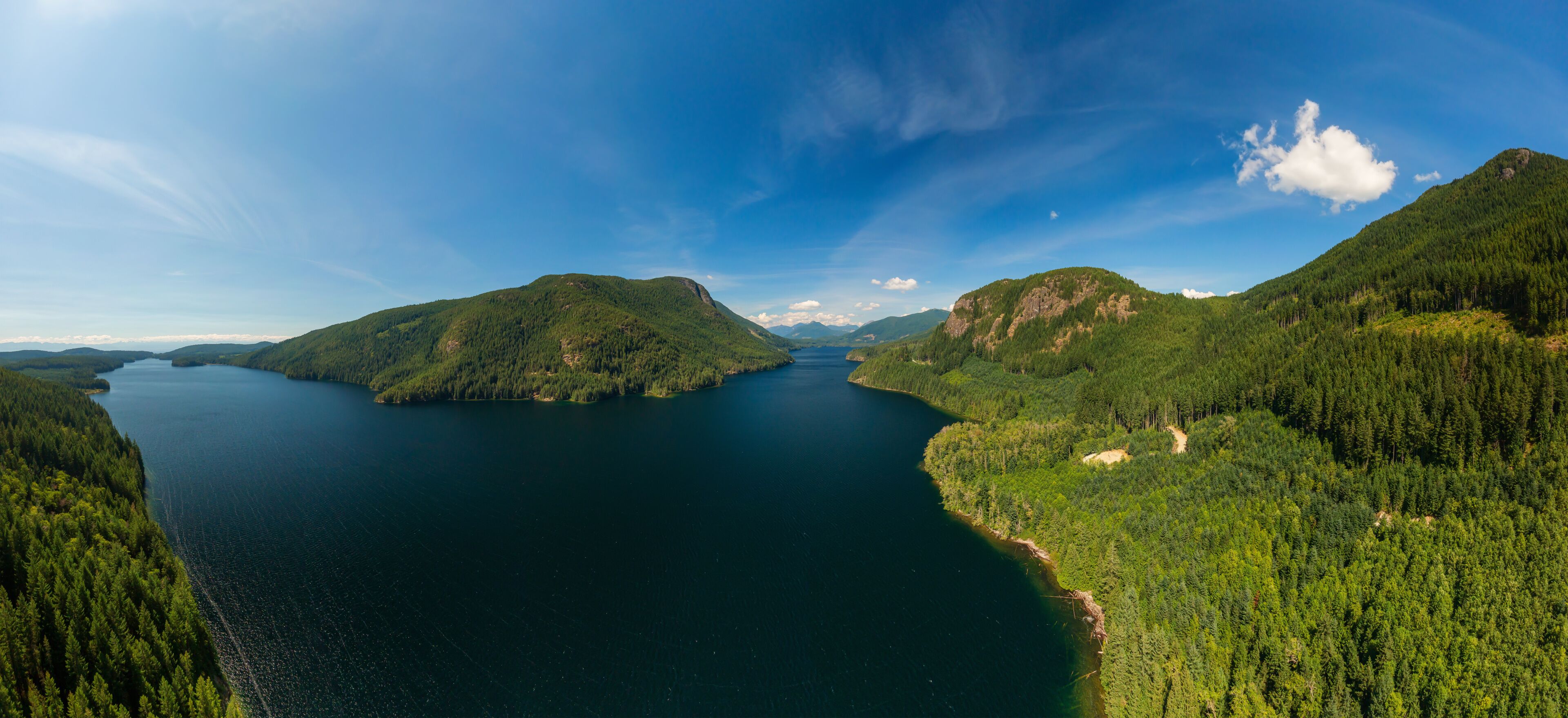 Aerial Panoramic View of Canadian Mountain Landscape during a sunny summer day. Taken near Powell River, Sunshine Coast, British Columbia, Canada.