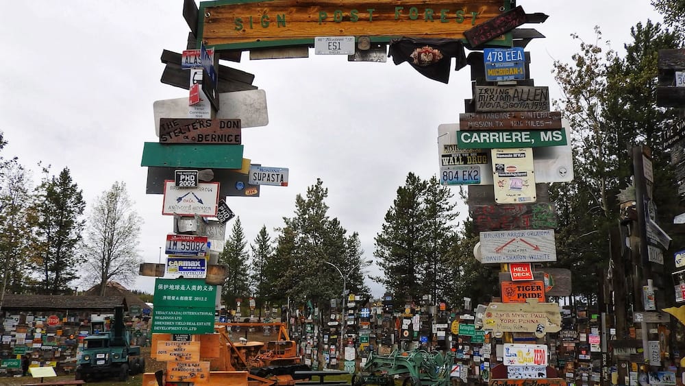 Sign Post Forest is a collection of signs at Watson Lake, Yukon Territories, and is one of the most famous of the landmarks along the Alaska Highway. It was started by a homesick GI in 1942. He was assigned light duty while recovering from an injury and erected the signpost for his hometown: Danville, Ill. 2835 miles. Wikipedia (September 2016)