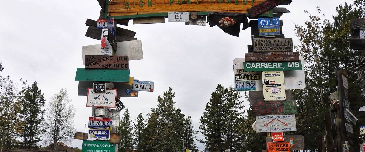 Sign Post Forest is a collection of signs at Watson Lake, Yukon Territories, and is one of the most famous of the landmarks along the Alaska Highway. It was started by a homesick GI in 1942. He was assigned light duty while recovering from an injury and erected the signpost for his hometown: Danville, Ill. 2835 miles. Wikipedia (September 2016)