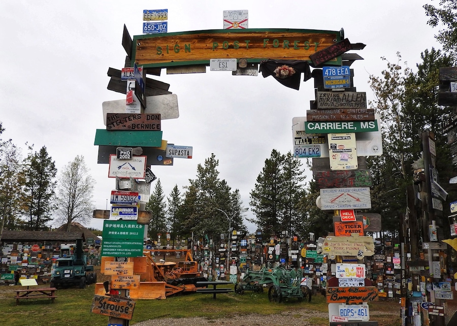 Sign Post Forest is a collection of signs at Watson Lake, Yukon Territories, and is one of the most famous of the landmarks along the Alaska Highway. It was started by a homesick GI in 1942. He was assigned light duty while recovering from an injury and erected the signpost for his hometown: Danville, Ill. 2835 miles. Wikipedia (September 2016)