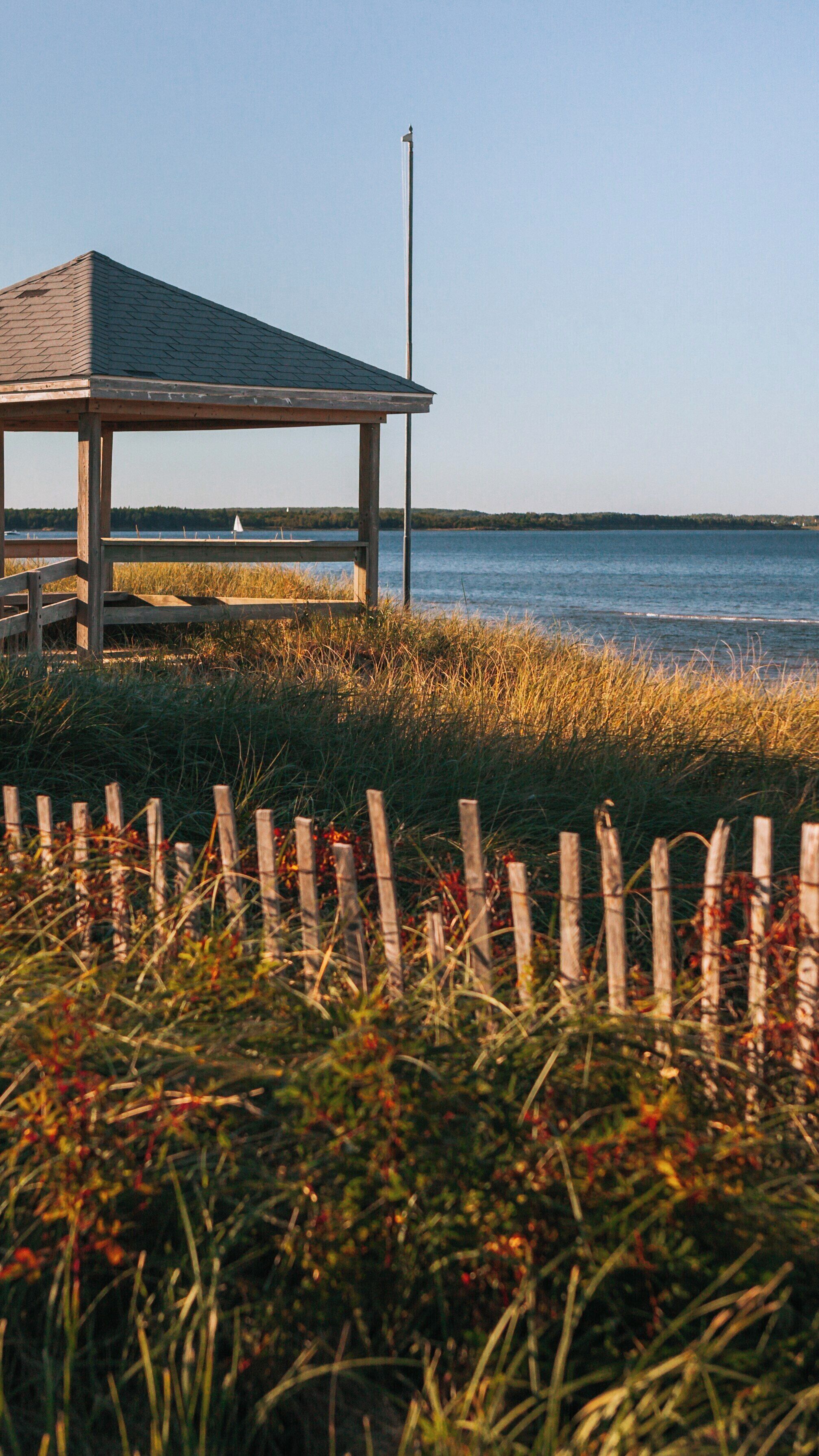 Experience the natural beauty and rustic charm of Parlee Beach Provincial Park in Shediac, New Brunswick during a serene late afternoon