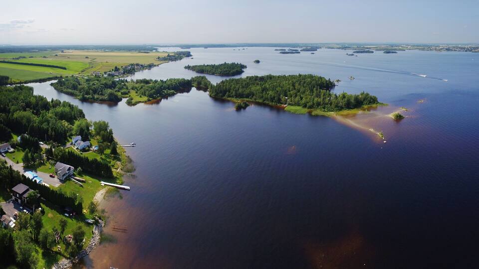 Aerial view of river mouth with small islands