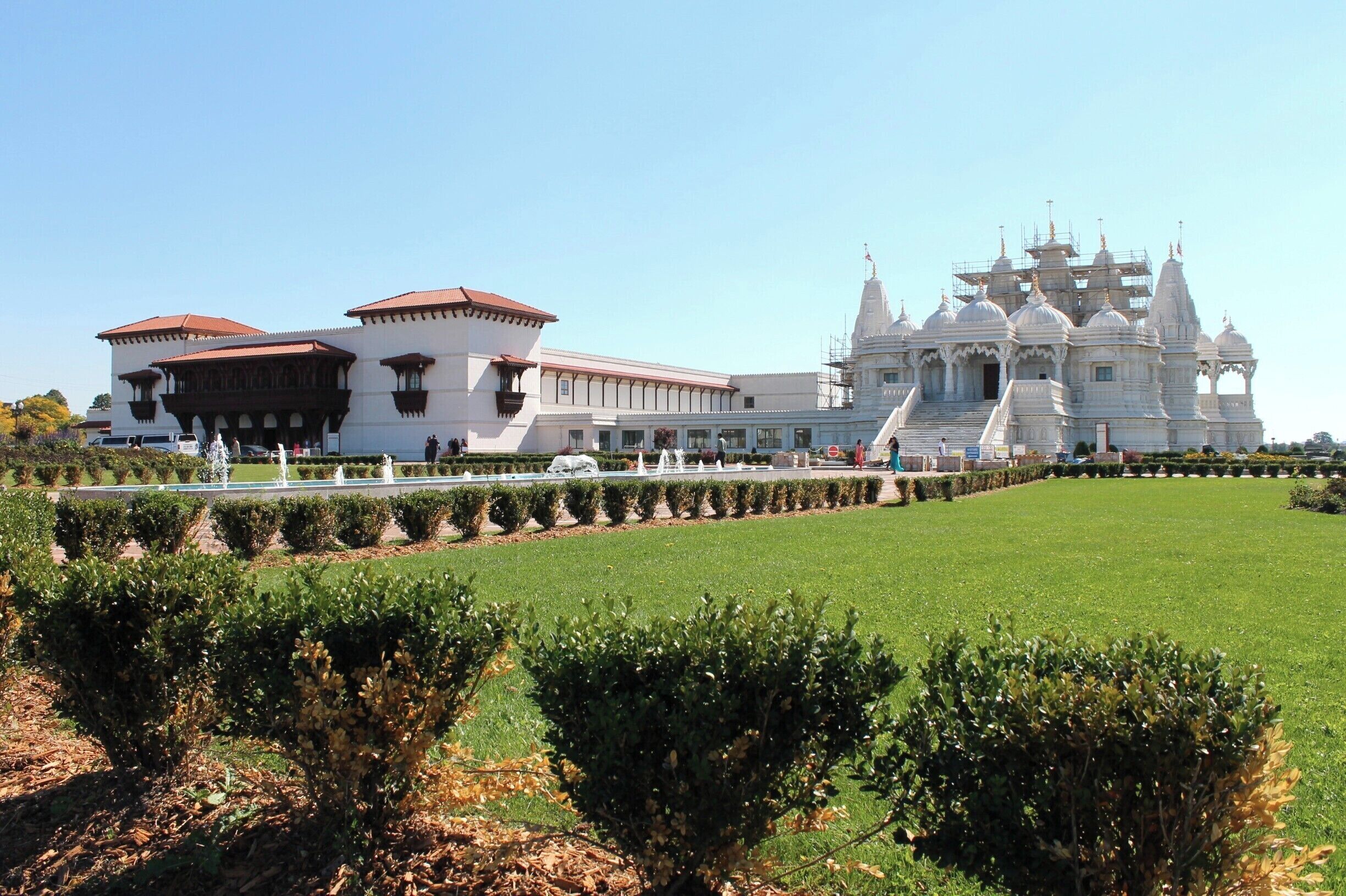 India? Nope: Canada! You'll find BAPS Shri Swaminarayan temple standing proudly in Toronto. Made from Italian marble, Turkish limestone, Burmese teak and Indian sandstone, it's an architectural wonder. #toronto #temple #canada