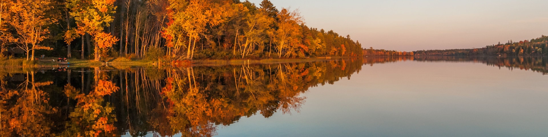 A warm September evening after a likewise day on a Northern Ontario lake as seen from a canoe. Northern Ontario lake at sundown on a late summer's day