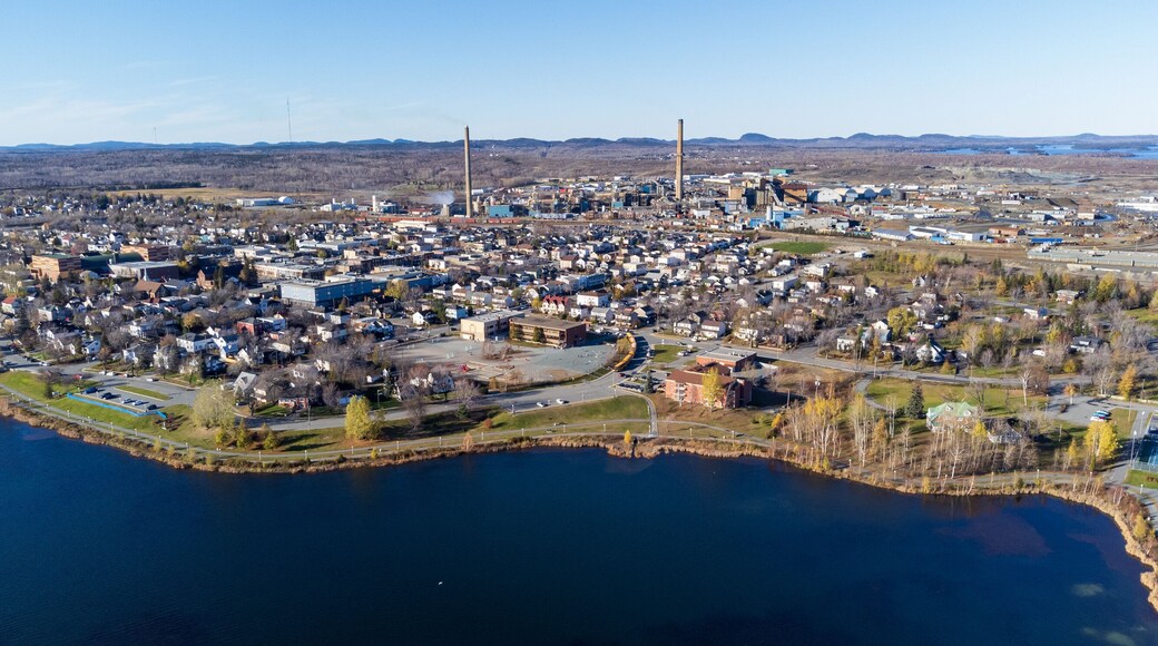 Aerial view of Rouyn-Noranda City and Osisko Lake in a fall season sunny day. Abitibi-Temiscamingue, Quebec, Canada.