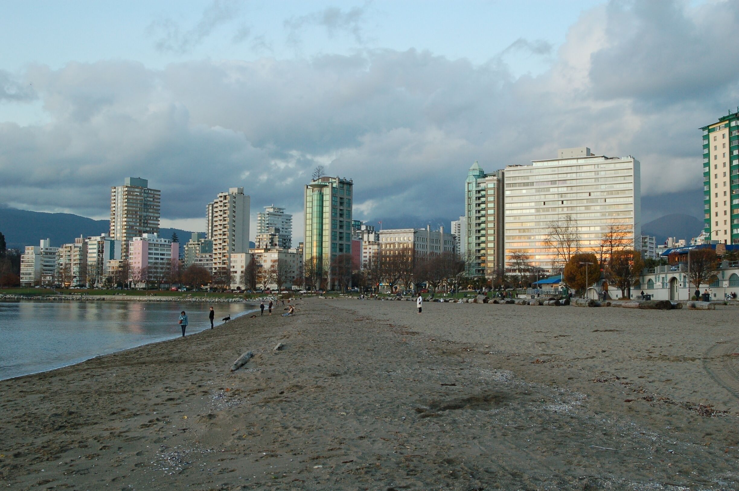 The beach at English Bay, Vancouver, a great place for a stroll or to sit and enjoy the sunshine and sunset. #Vancouver #Canada 