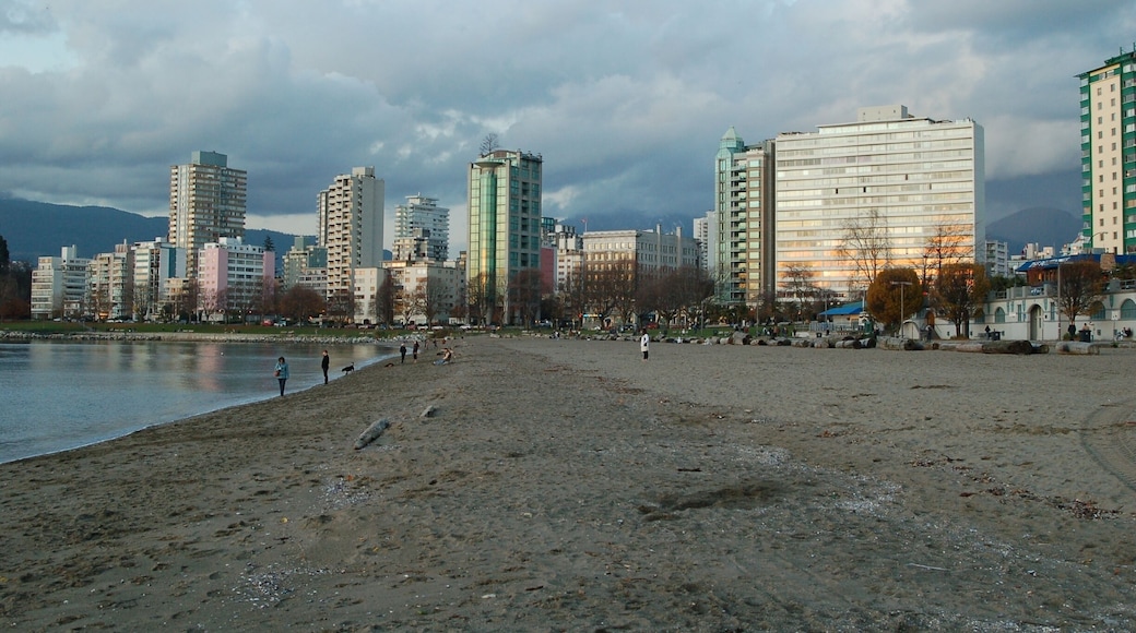 The beach at English Bay, Vancouver, a great place for a stroll or to sit and enjoy the sunshine and sunset. #Vancouver #Canada