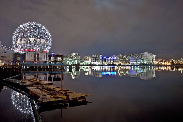 It is hard to describe the False Creek. It is a combination of green areas like a park with perfect grass, paths to run or ride a bike, beautiful docks with ships and kayaks, amazing bars and beautiful condos. The entire extension of the False Creek and the parks surrounding it are some of my favorite parts of Vancouver.

Near the end of False Creek you'll find Science World, BC Place, and Rogers Arena.  Very common to see dragon boat practices occuring.

#Reflections