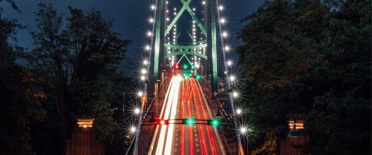 Park at prospect point and walk east until you reach the overpass that looks out to the lions gate bridge.