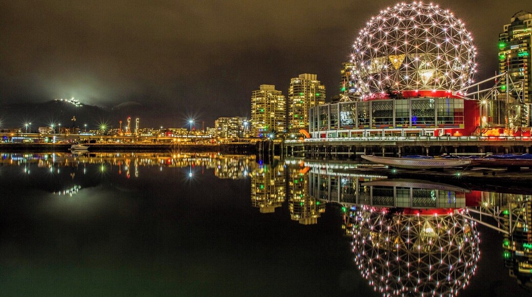 False Creek runs from English Bay up to the Science Center. There's now a walking and bike path that runs completely around False Creek - from English Bay, past Yaletown, around the Science Center, and up to Granville Island and beyond.
False Creek used to be Vancouver's industrial inner harbour. One-hundred years later, it has been retrofit and renovated and gentrified. Some of the architecture preserves that history. What remains now is a peaceful places where sky and sea meet. Ringed with places for coffee, places to sit and look at the sea and sky change as big and small boats move in and out of the inner harbour.
#Reflections