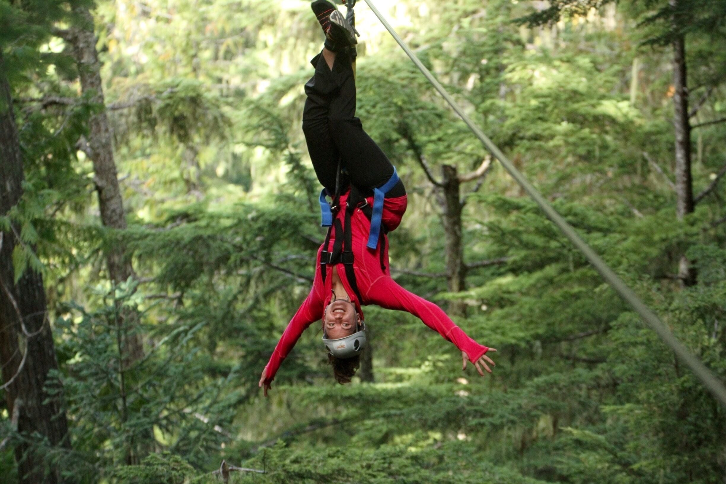 Did the Eagle Zip Line Tour with Zip Trek, and it was awesome! 5 great lines. The first is side by side do you can go with it "race" a friend! This is line two, where they give you the option/encourage you to go upside down! So I had to try :)
The best part of zip trek is they do 100% of the breaking for you so you don't even have to think about it... I've been on others where you do the whole thing yourself (scary!), or another where you "help" and do like half the breaking by assuming a certain position and wiggling your handles.... But not here... You just get to enjoy! The only potential downside to this is you end up turning around backwards which just felt a little funny... But it was still amazing!