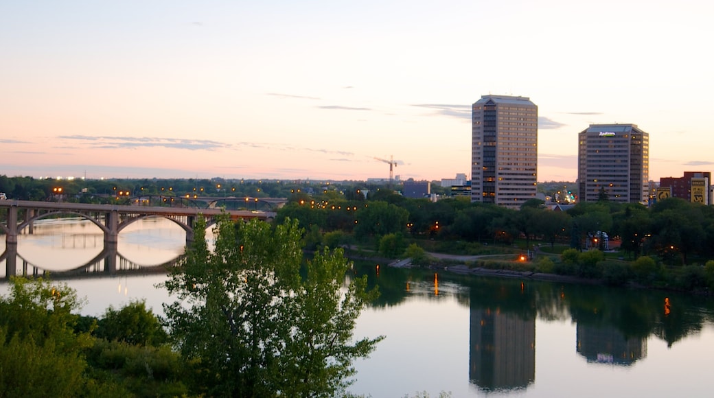 Saskatoon which includes a city, a sunset and a bridge