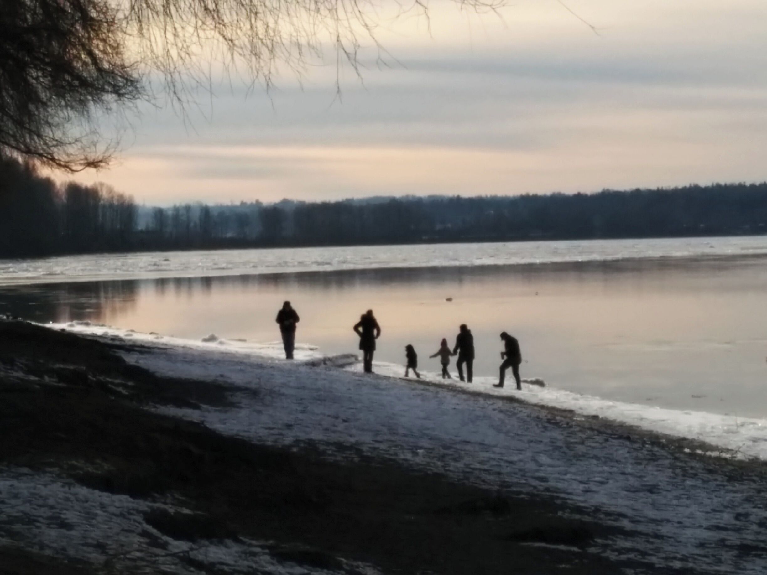 Admiring the partially frozen river