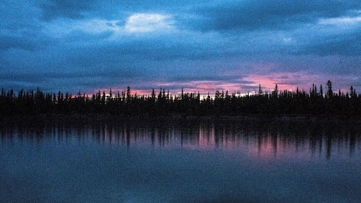 Sunset while camping along the Yukon River outside Whitehorse, Yukon, Canada.