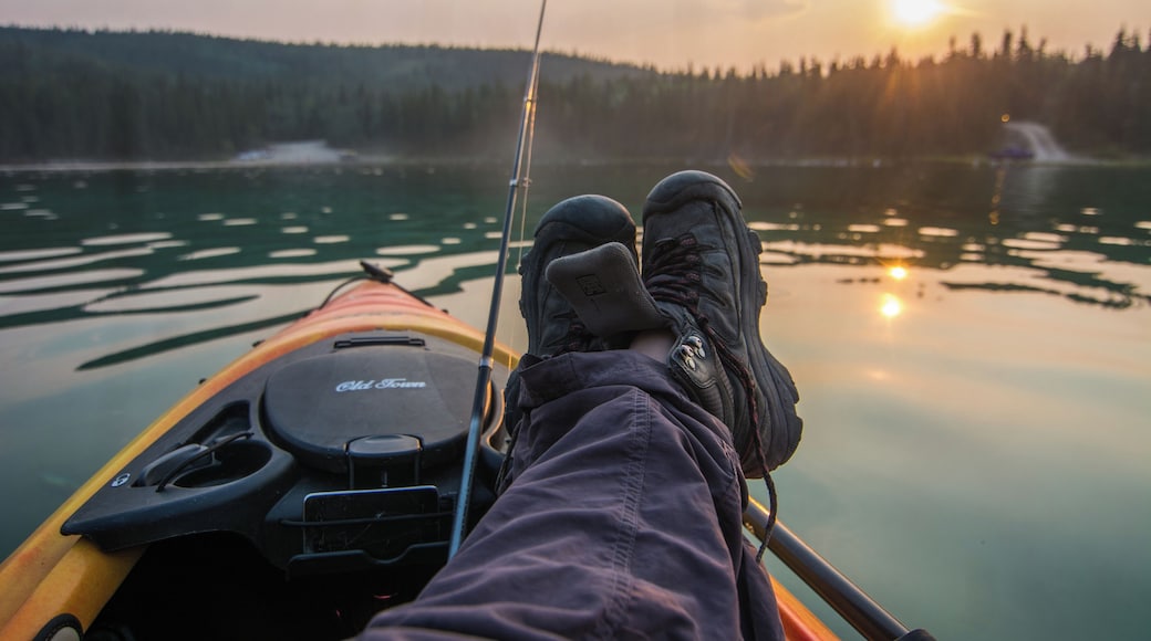 kayaking in the midnight sun. the opportunity for fun all day long as you paddle this lake near Whitehorse, YT you are totally immersed by the wild. Take advantage of the long days and try t catch your dinner too. #Adventure