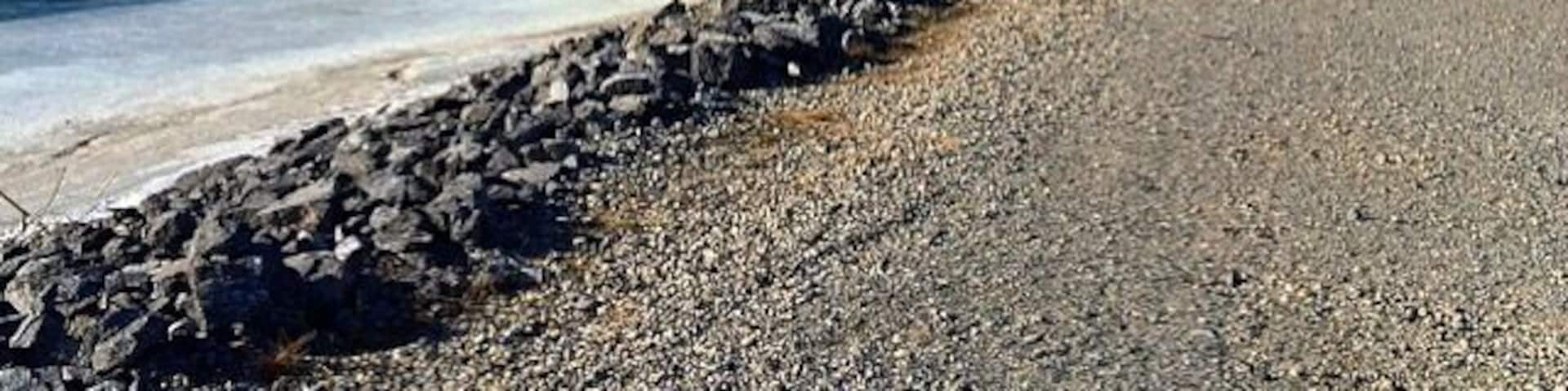 Wandering up the trail by frozen Barrier Lake in Kananaskis, Alberta #hiking