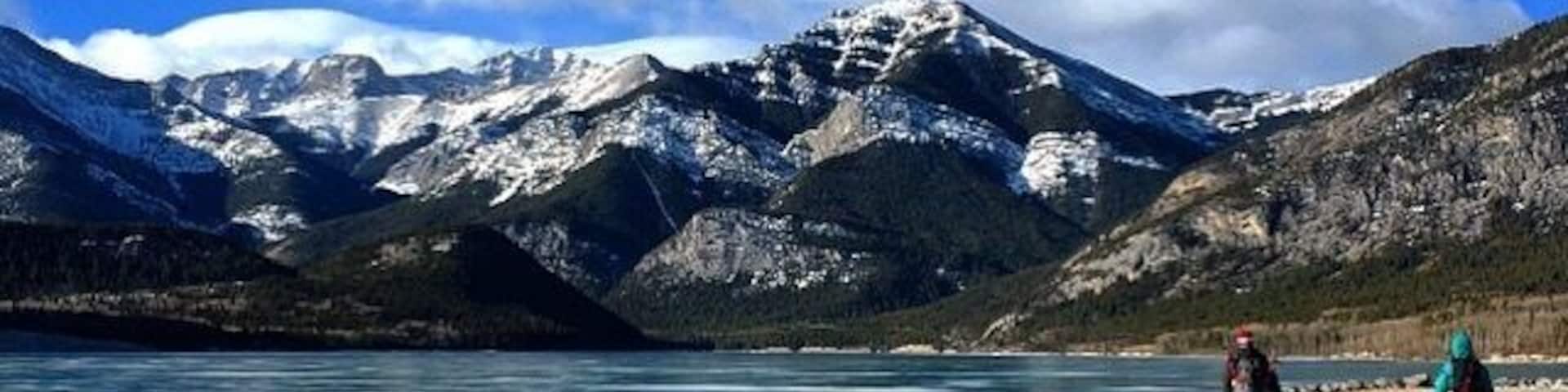 Wandering up the trail by frozen Barrier Lake in Kananaskis, Alberta #hiking