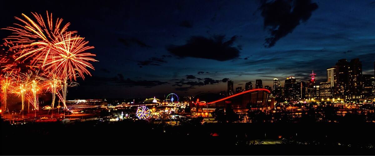 Calgary skyline with a sprinkle of stamped fireworks.
