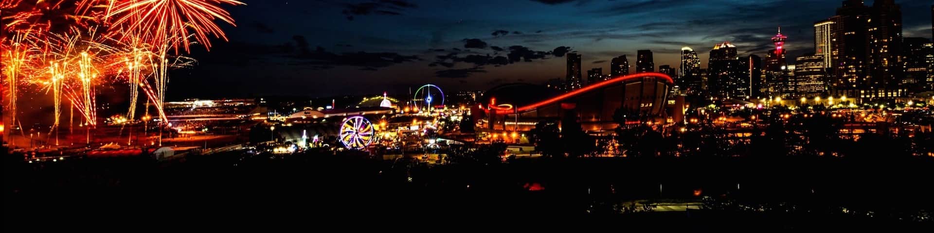 Calgary skyline with a sprinkle of stamped fireworks.