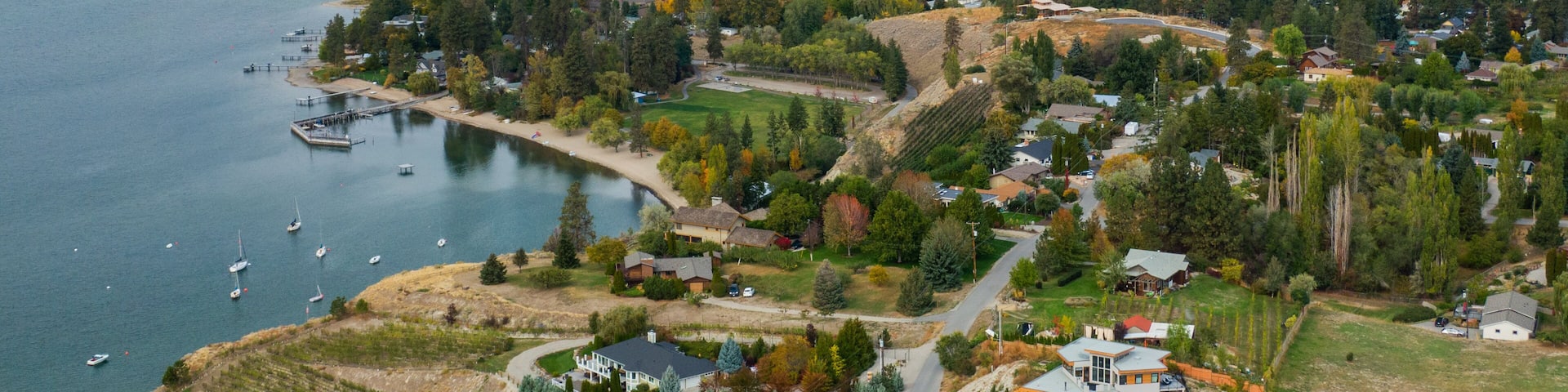 Penticton featuring landscape views, a lake or waterhole and a small town or village