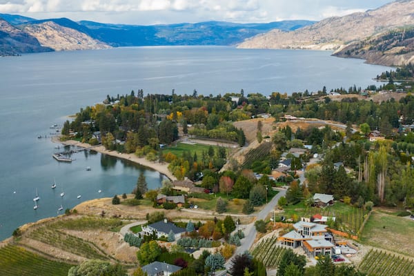 Penticton featuring landscape views, a lake or waterhole and a small town or village
