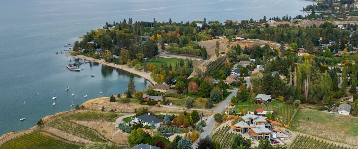 Penticton featuring landscape views, a lake or waterhole and a small town or village