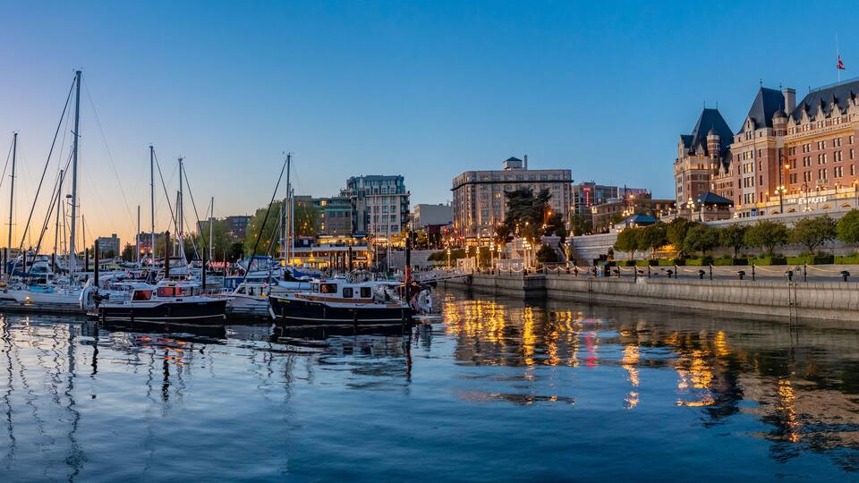 Panorama of Fairmont Empress Hotel and Inner Harbour at evening in Victoria, Canada