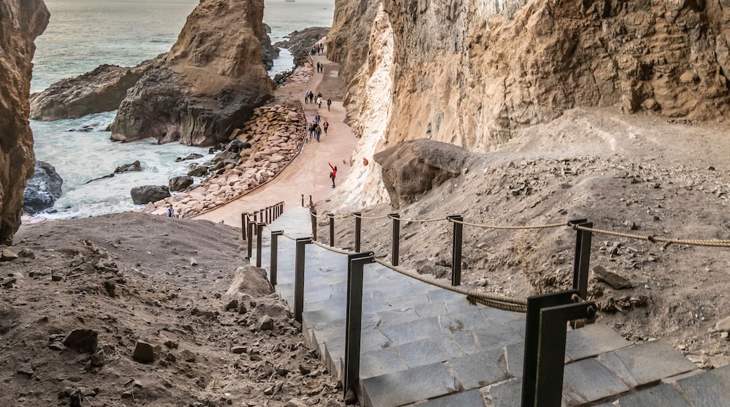 The famous travel destination of Cuevas de Anzota (Anzota Caves). Amazing cliff walk over Pacific Ocean waters with awe caves with huge windows over the sea. A wonderful and fantasy landscape