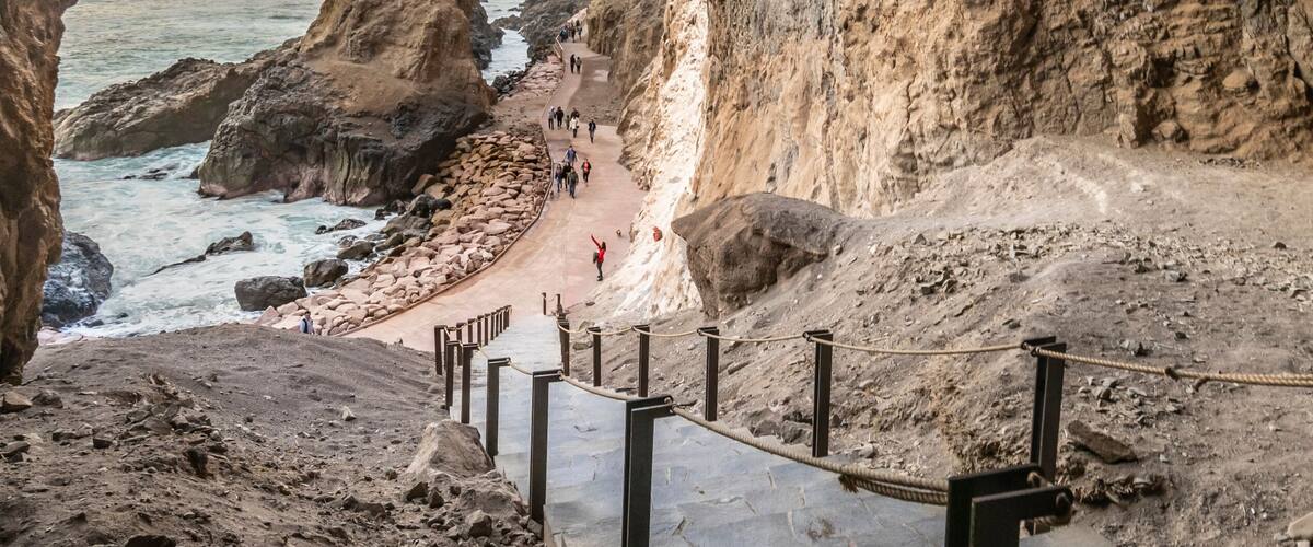 The famous travel destination of Cuevas de Anzota (Anzota Caves). Amazing cliff walk over Pacific Ocean waters with awe caves with huge windows over the sea. A wonderful and fantasy landscape