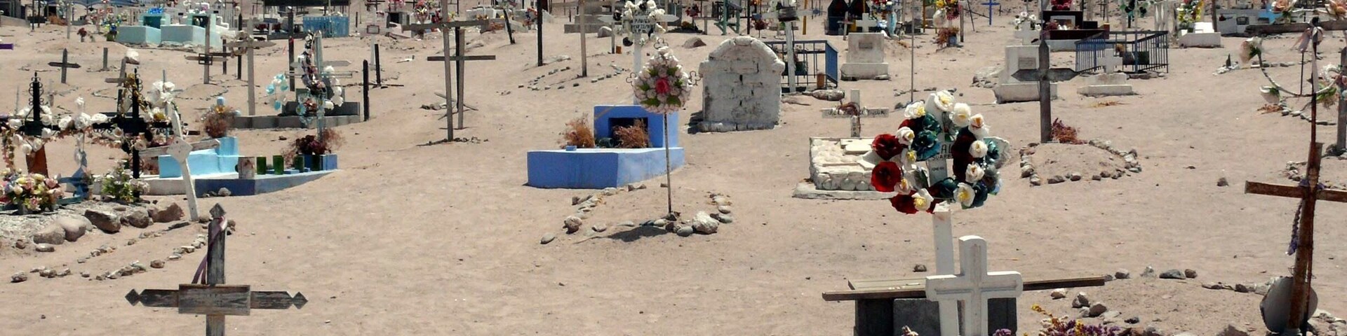 From the port city of #Arica traveling to the #Luca NP you pass the town on #Poconchille. Town makes it seem big. But it's not. What's cool about it is this not so little desert cemetery. Fun to walk along the graves. An unexpected sight.