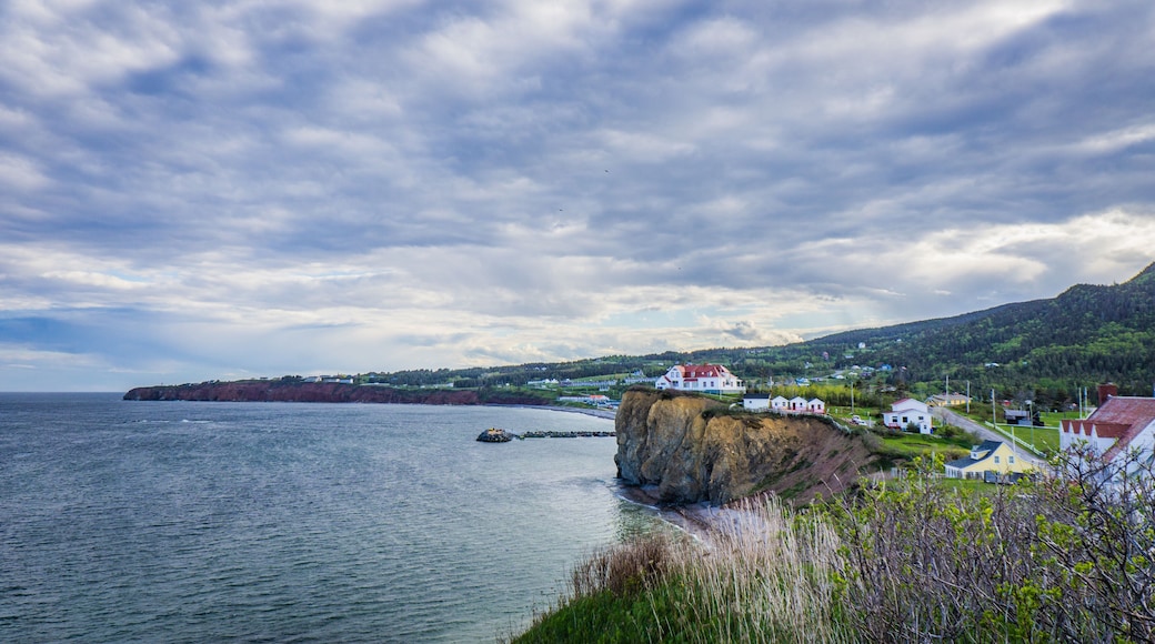View on Percé, the road 132, the cliffs, the beach and the ocean from Cape Mont Joli next to the Percé Rock in Quebec (Canada)
