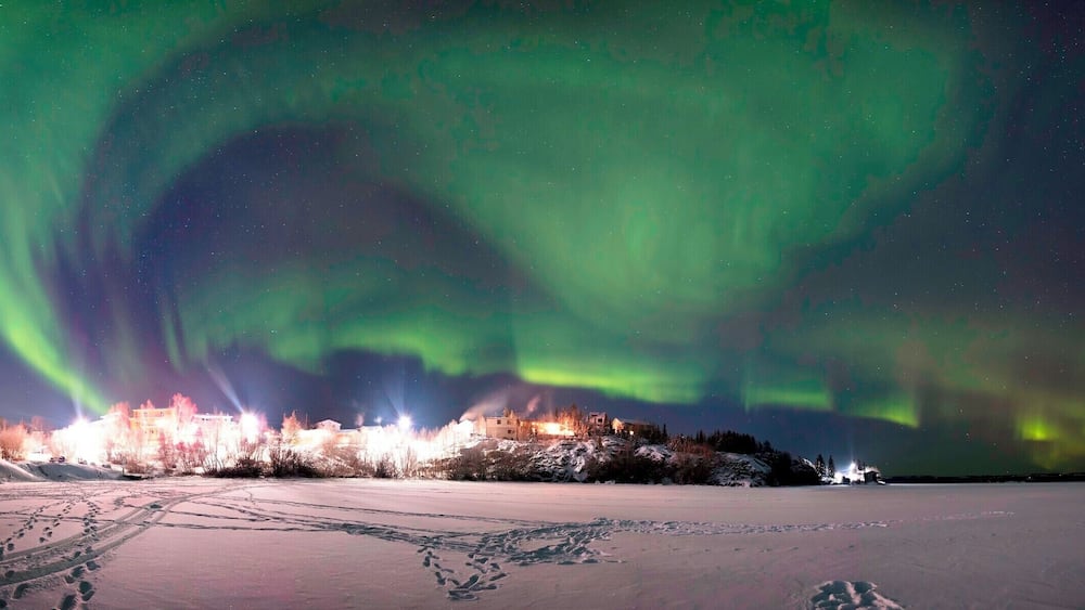 This is why you fly 3000 miles, 14 hours.
This is why you stand out in -30 weather, slowly freezing, your camera turns into an ice cube, and dies.
I have seen a total eclipse. I have watched dozens of satellites cross the sky at night, I have seen meteors, some that broke apart and turned different colors, I have seen super moons and sun spots and so many things that make the sky a truly amazing thing to look up at. This, this was something that even with my pre-excitement I can't even begin to describe how enchanting it was to witness. I stood there for well over a hour watching the dance of light. At one point the Aurora stretched from horizon to horizon with waves of color dancing from one direction to the other.