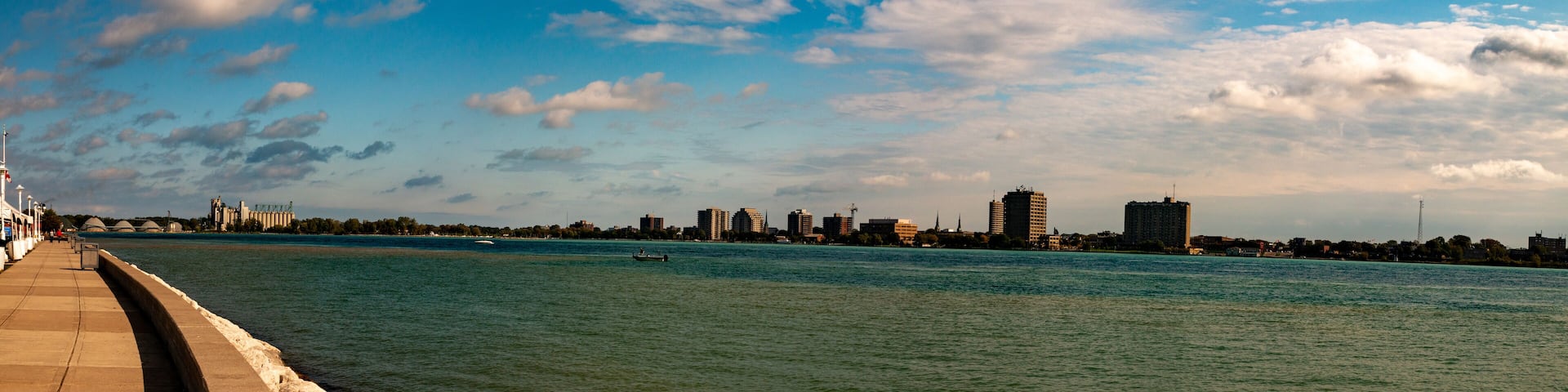 Port Huron Michigan in Panoramic format wide angle to show the industrial skyline. Nice autumn day