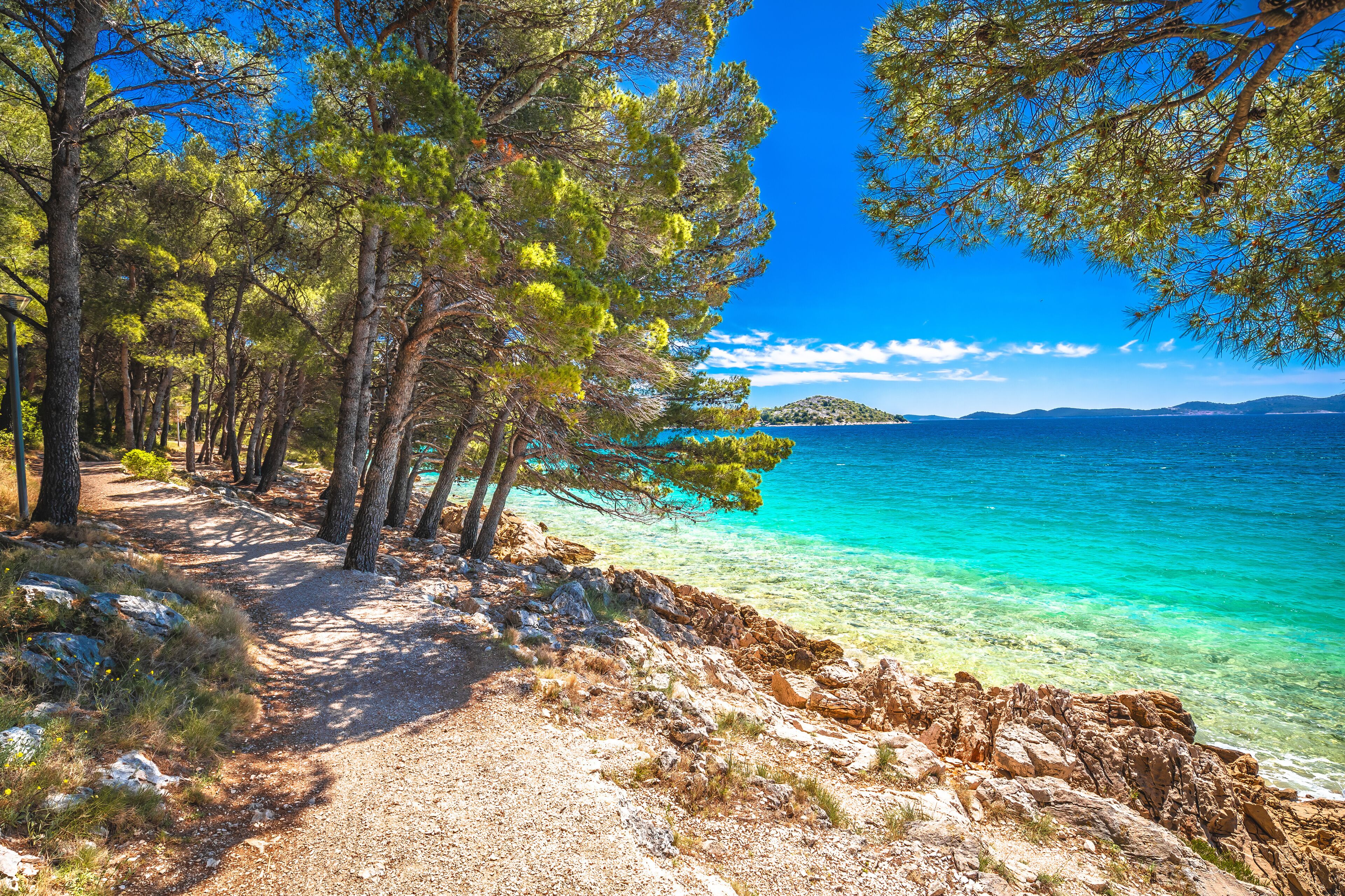 Idyllic turquoise rocky beach landscape view in Zadar riviera