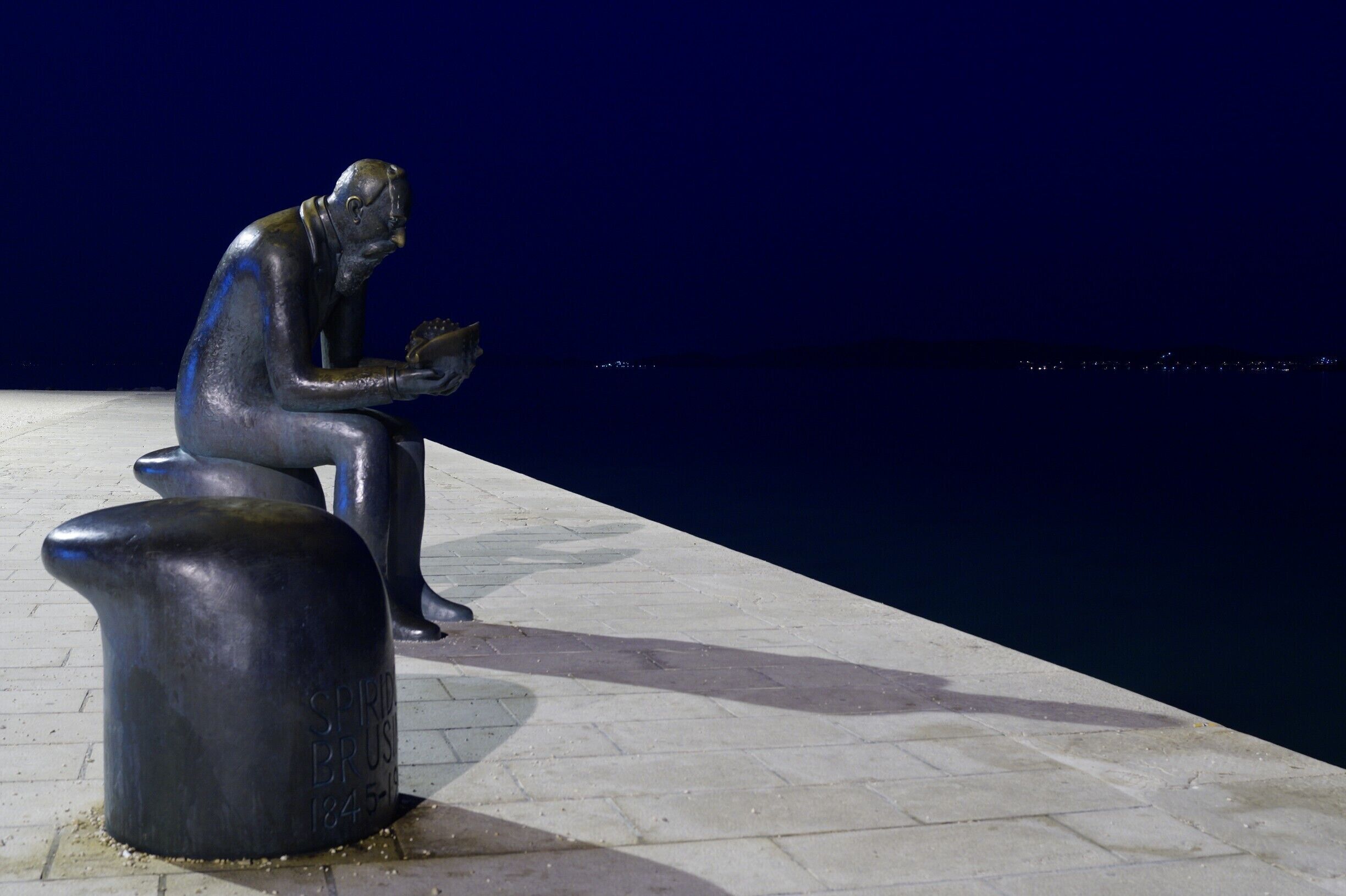 Spiridon Brusina, scientist from Zadar. 
You can see his statue on the waterfront.

Check out more photos here
https://putujuciblog.wordpress.com/2015/02/24/always-sunny-in-zadar/



