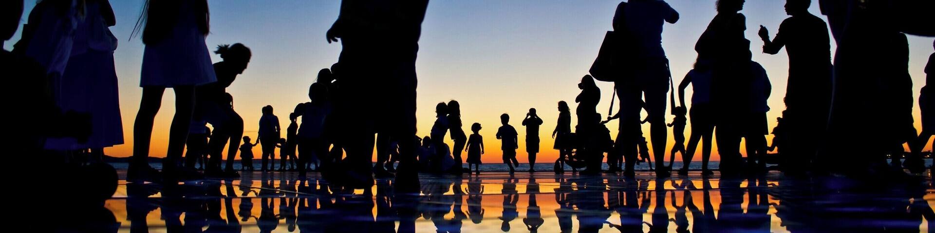 People reflections on colorful sunset in Zadar, Croatia. Reflections on "Greetings to the sun" solar installation powered by the Sun at day, and producing multiple colors at night.
#BVSBlue